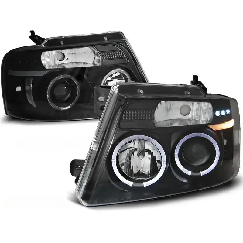 Hovedlykter Ford F150 MK 11 04-08 Angel Eyes Black med svarte detaljer og runde projektorlinser.
