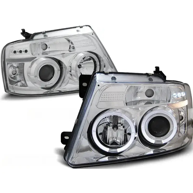 Hovedlykter Ford F150 Mk11 04-08 Angel Eyes Chrome med to runde linser og LED-lys mot hvit bakgrunn.