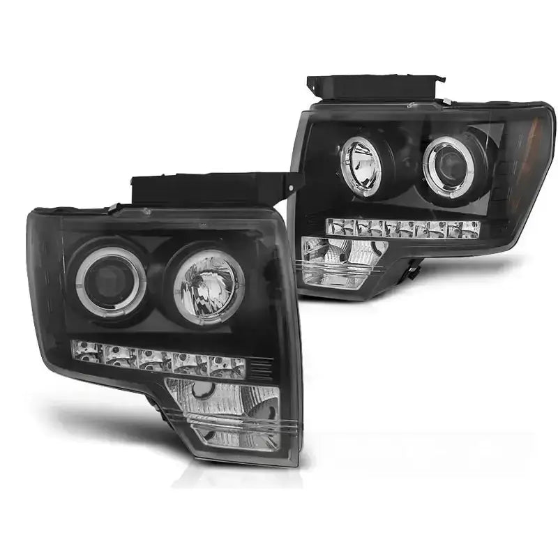 Frontlykter Ford F150 Mk12 08-14 Angel Eyes Black med sorte detaljer og LED-striper, sett forfra.