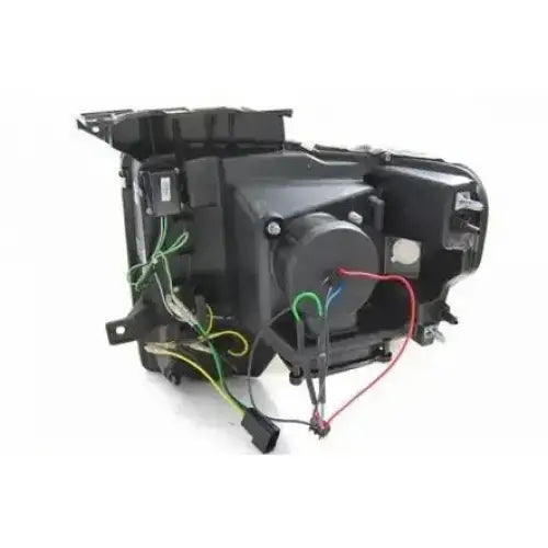 Hovedlys Ford F150 Mk12 08-14 Tube Light Black sett bakfra med synlige ledninger og koblinger.