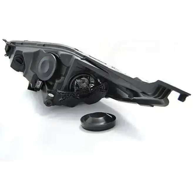 Hovedlys Ford Fiesta MK7 LED DRL Chrome sett bakfra med avtagbar dekselring og synlige komponenter.