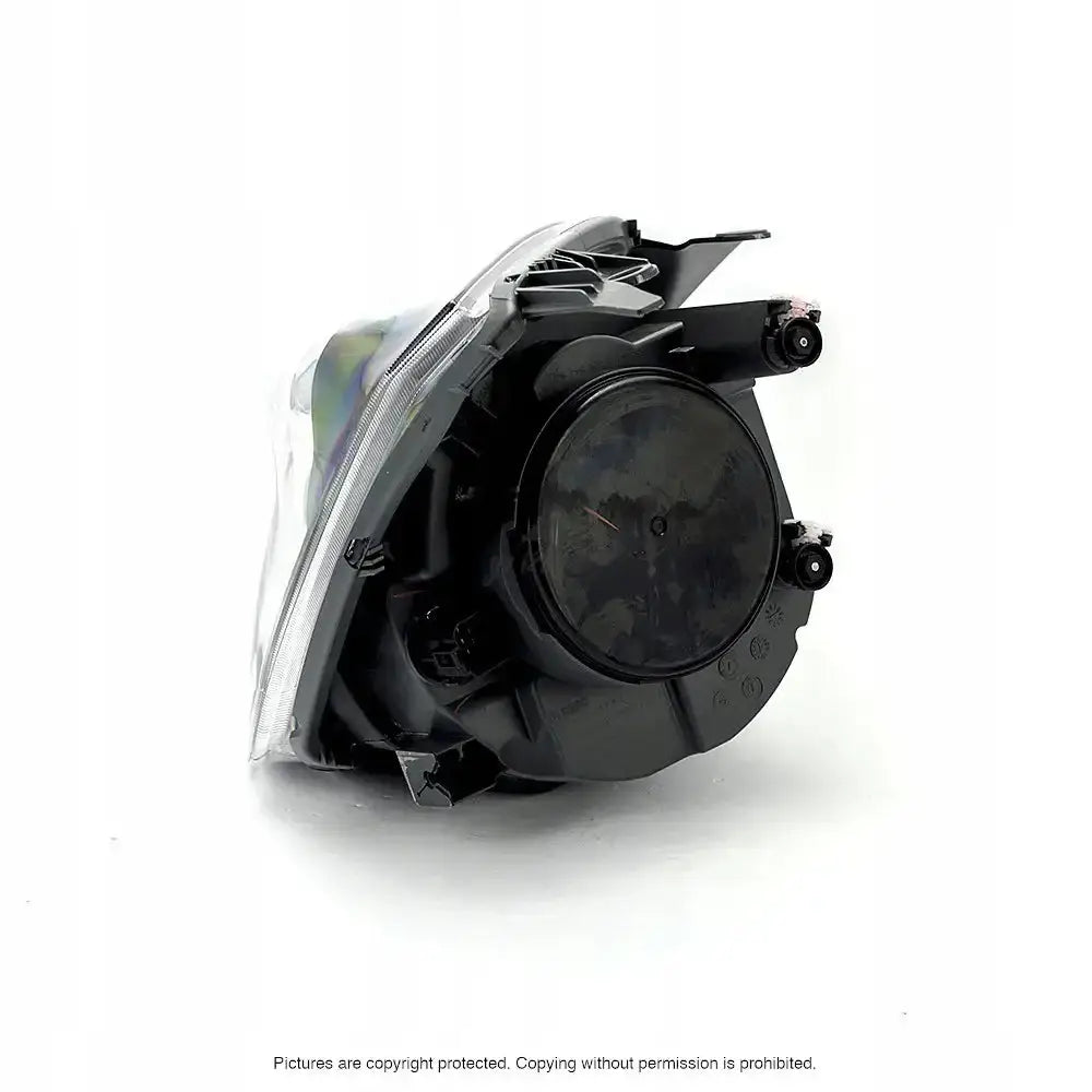 Headlights Ford Fiesta V MK6 05-08 sett bakfra med sort deksel og plastdetaljer på hvit bakgrunn.