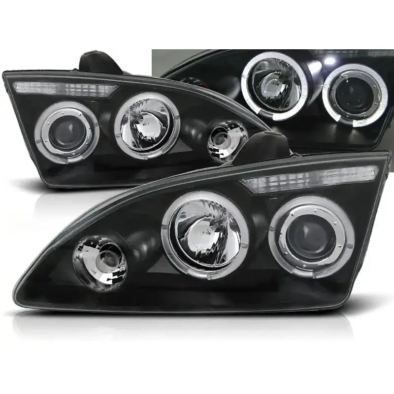 Frontlykter Ford Focus II Angel Eyes Black med sorte og kromdetaljer, vist fra skrå vinkel.