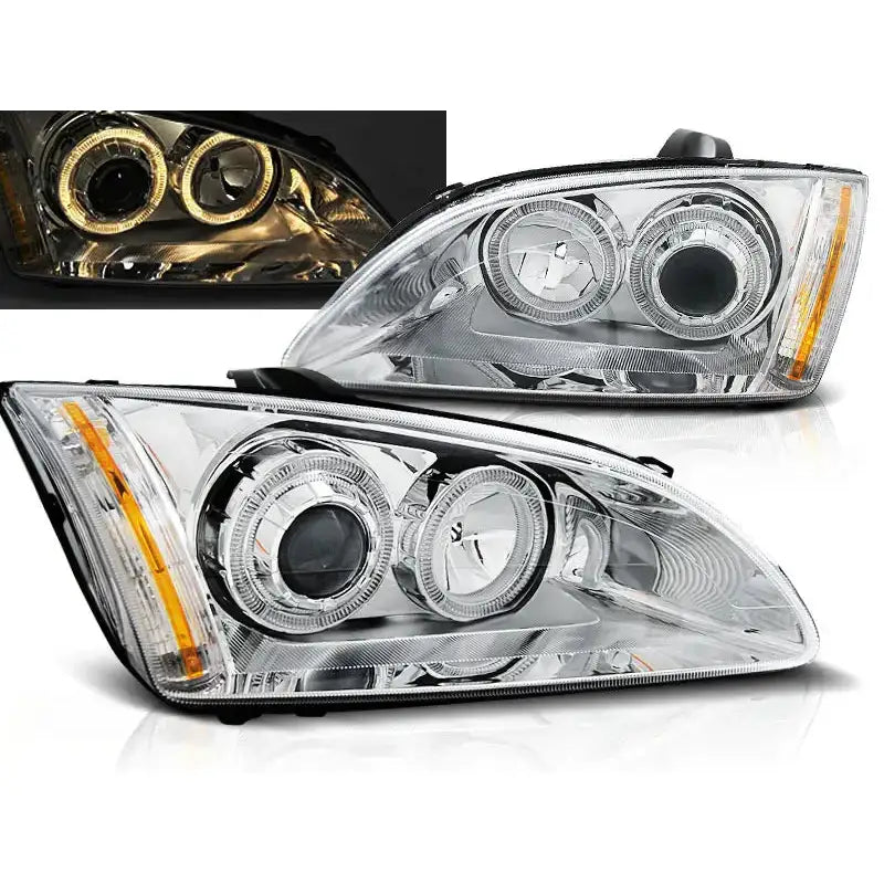 Frontlykter Ford Focus II Angel Eyes Chrome med doble projektorlinser og oransje sidemarkering.