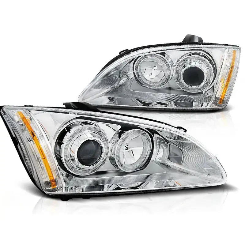 Hovedlykter Ford Focus II Angel Eyes Chrome med runde reflektorer og oransje blinklysstripe.