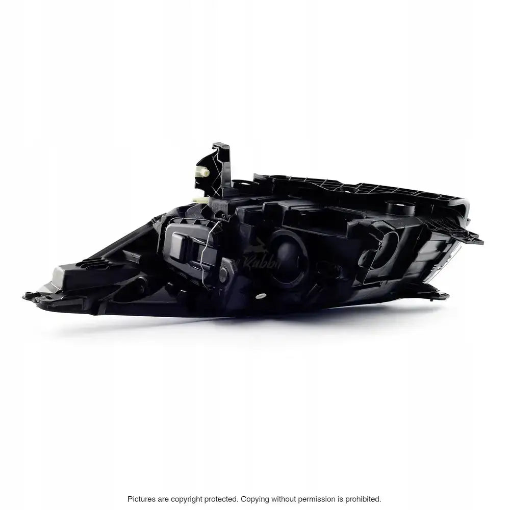 Headlights Ford KUGA II frontlykt sett fra undersiden og siden med synlige tekniske detaljer.