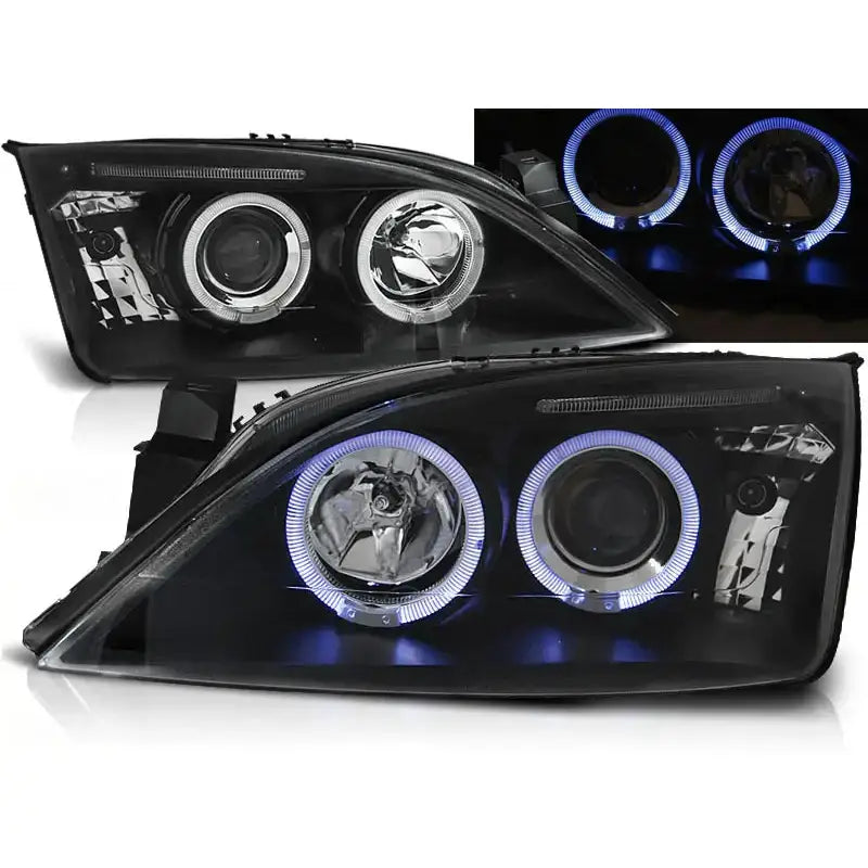 Frontlykter Ford Mondeo Angel Eyes Black med runde linser og blå LED-ringer, detaljvisning med lys.