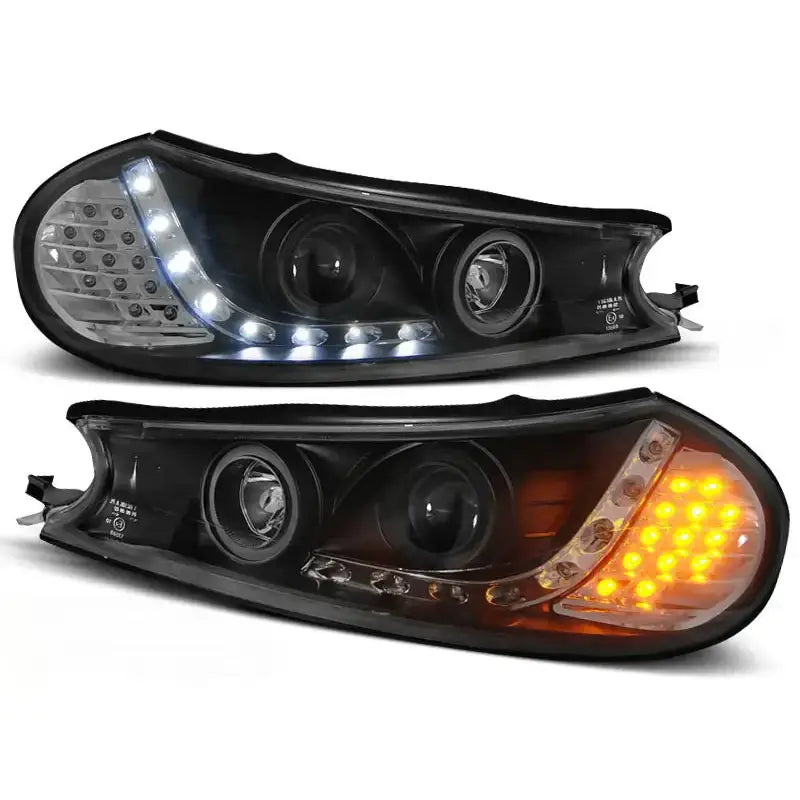 Hovedlykter Ford Mondeo 10.96-08.00 Black Led med tent hvit LED og oransje blinklys, vist forfra.