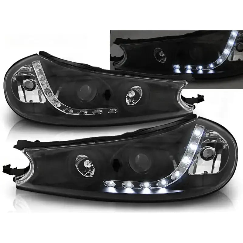 Frontlykter Ford Mondeo 10.96-08.00 Black Led med klare linser og buet design, sett forfra.
