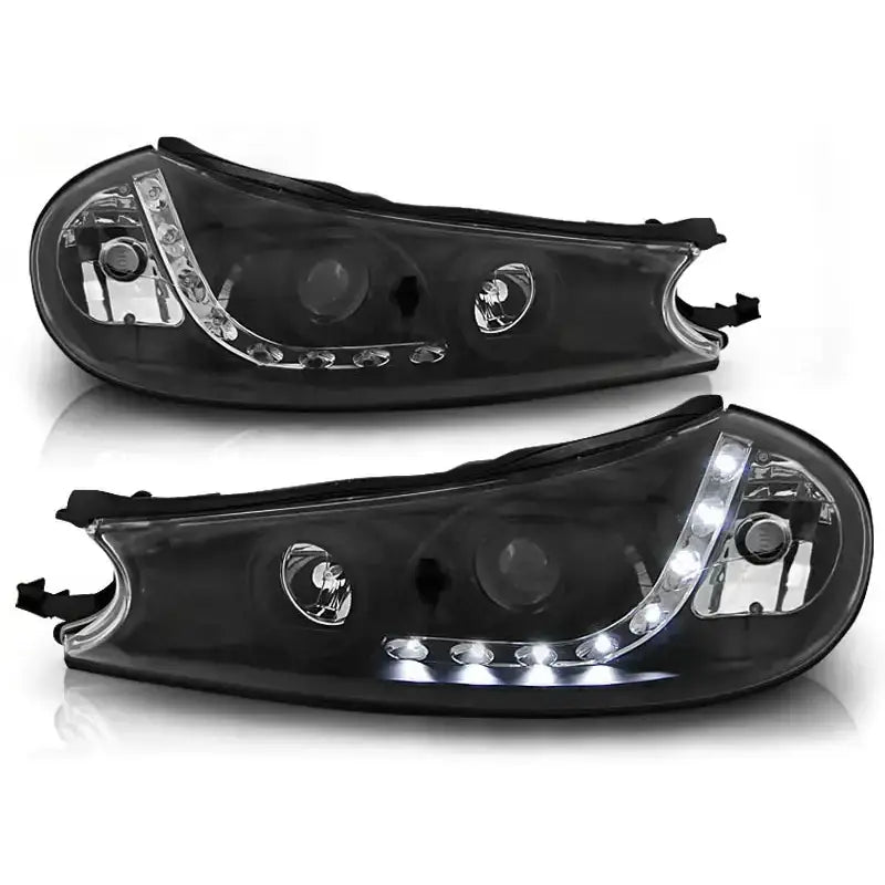 Hovedlykter Ford Mondeo 10.96-08.00 Black LED, sett fra skrå frontvinkel med kromdetaljer.