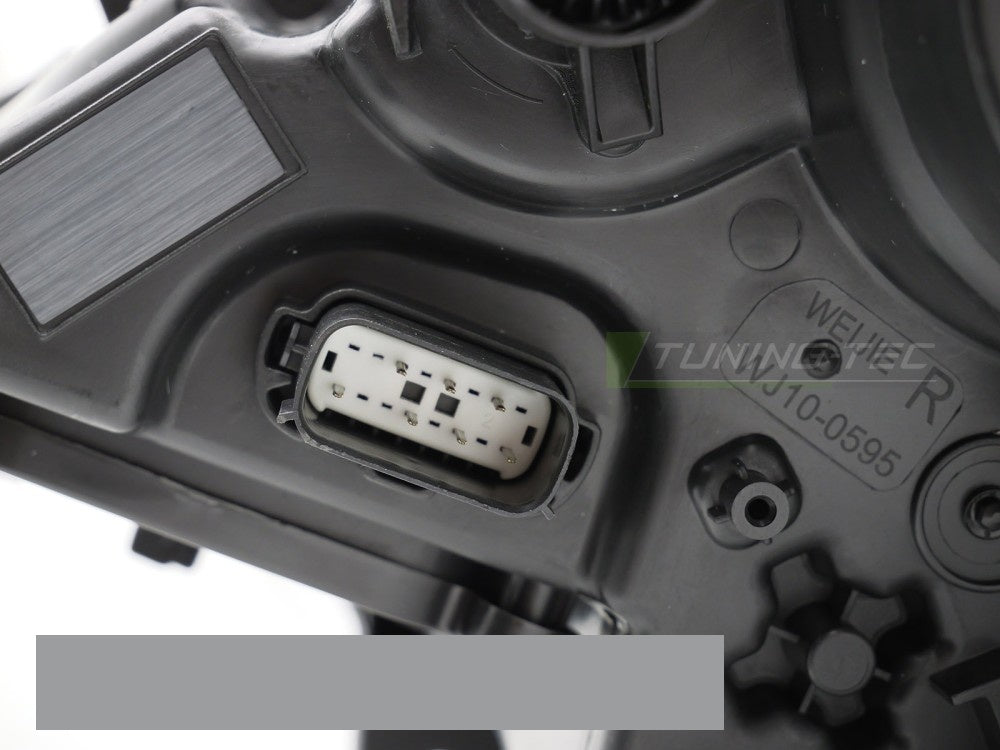 Detaljbilde av LED-teknologi i svart frontlykt til Ford Mustang 14–17