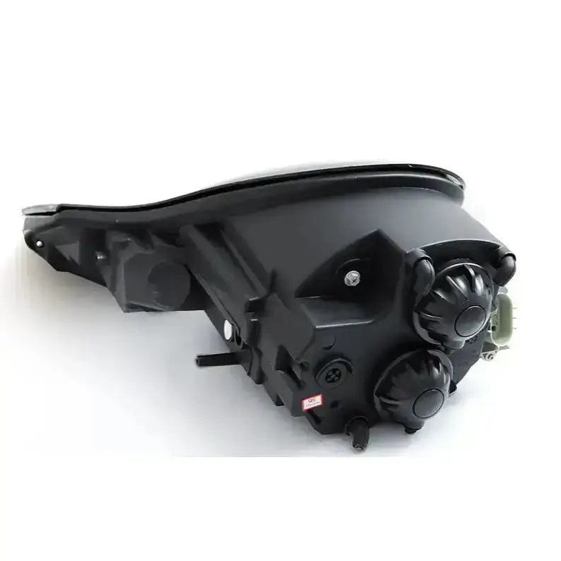 Headlights bakside av Glossy Black Porsche Boxster 96-04 med synlige justeringsskruer i plast.