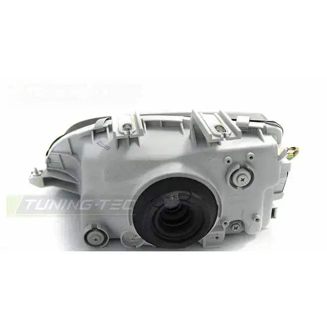 Hovedlykter Honda Civic 09.91-08.95 bakside med monteringspunkter og sort gummitetning i midten.