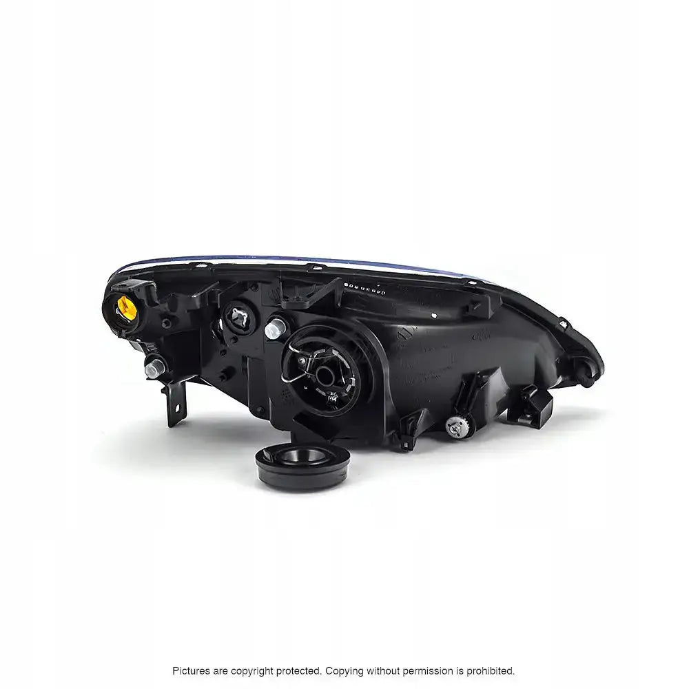 Headlamp Honda Civic 7 frontlykt sett bakfra med synlig pæreinnfesting og avtagbar plastdeksel.