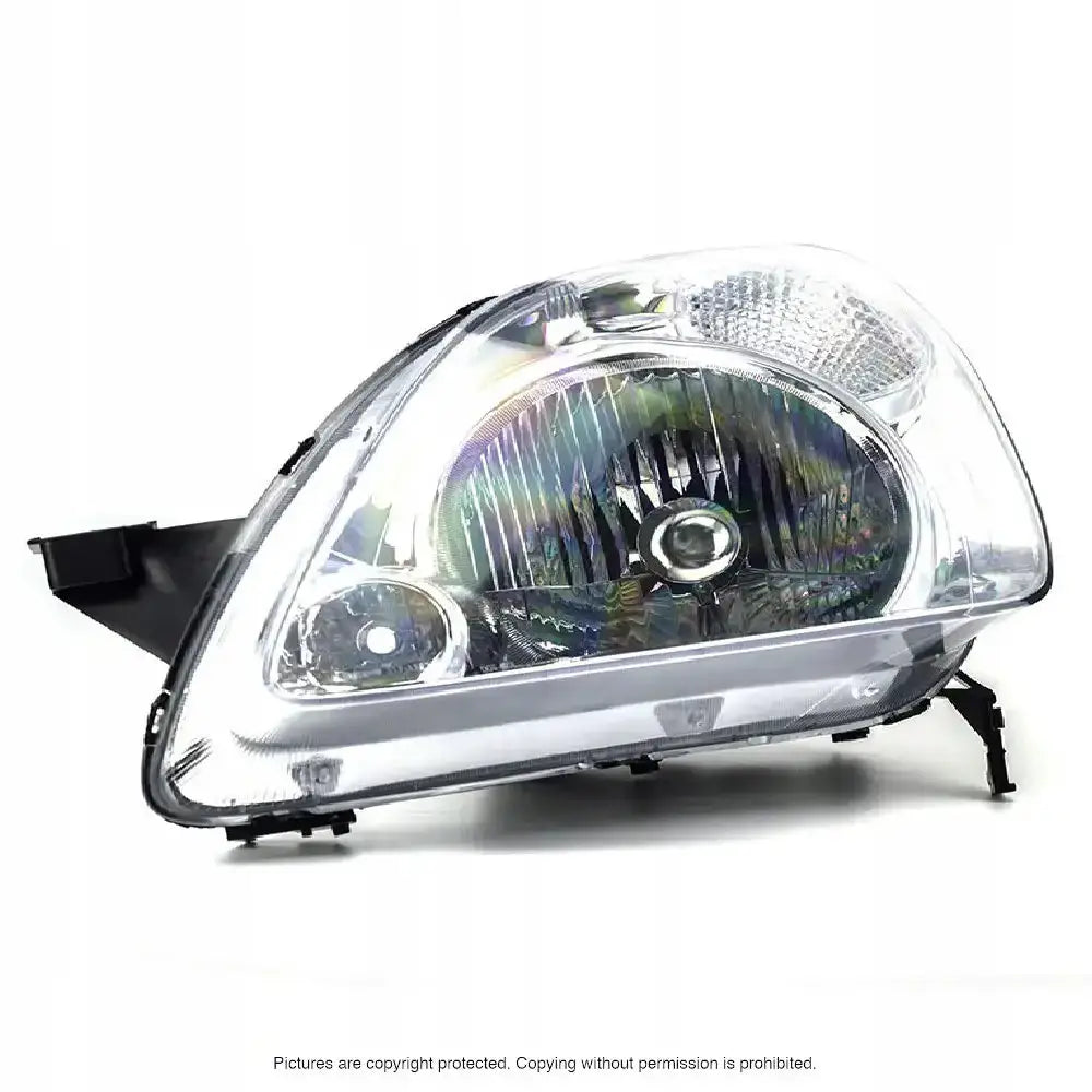 Hovedlys Honda CRV 01-04 H4 med klar plast og kromdetaljer, skrå forsidevisning mot hvit bakgrunn.