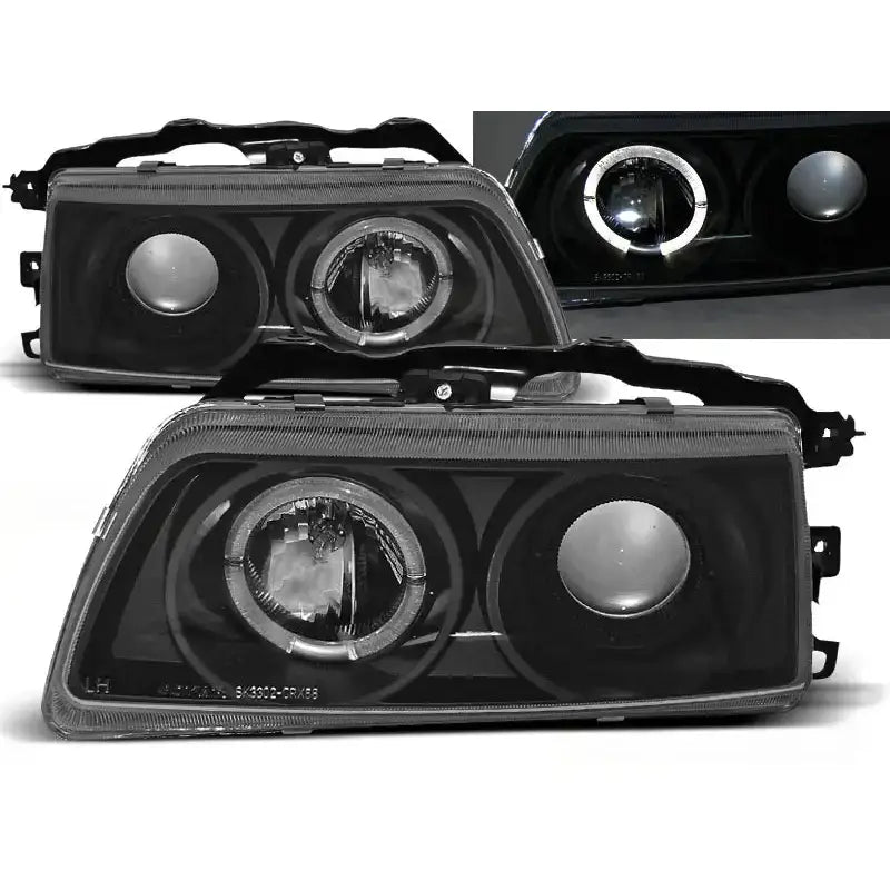 Frontlykter Honda CRX 09.87-89 Angel Eyes Black i svart med runde reflektorer og halo-lysring.