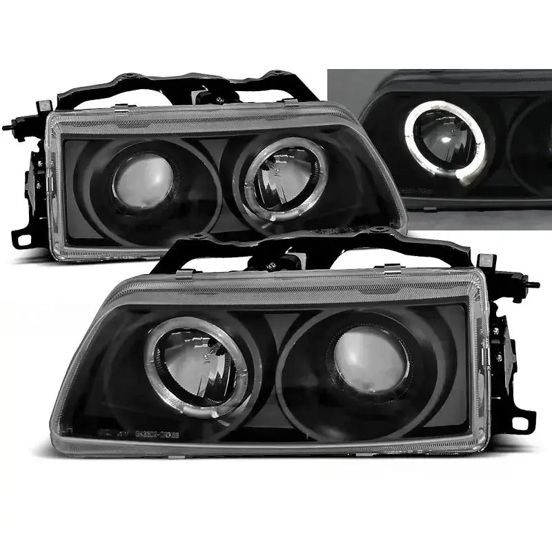 Frontlykter Honda CRX 90-02.92 Angel Eyes Black med sorte hus og hvit LED-ring, sett forfra.