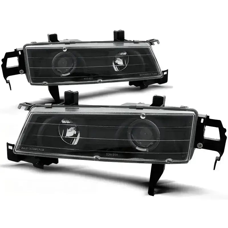 Hovedlykter Honda Prelude Angel Eyes Black med sorte og klare detaljer, vist fra skrå vinkel.