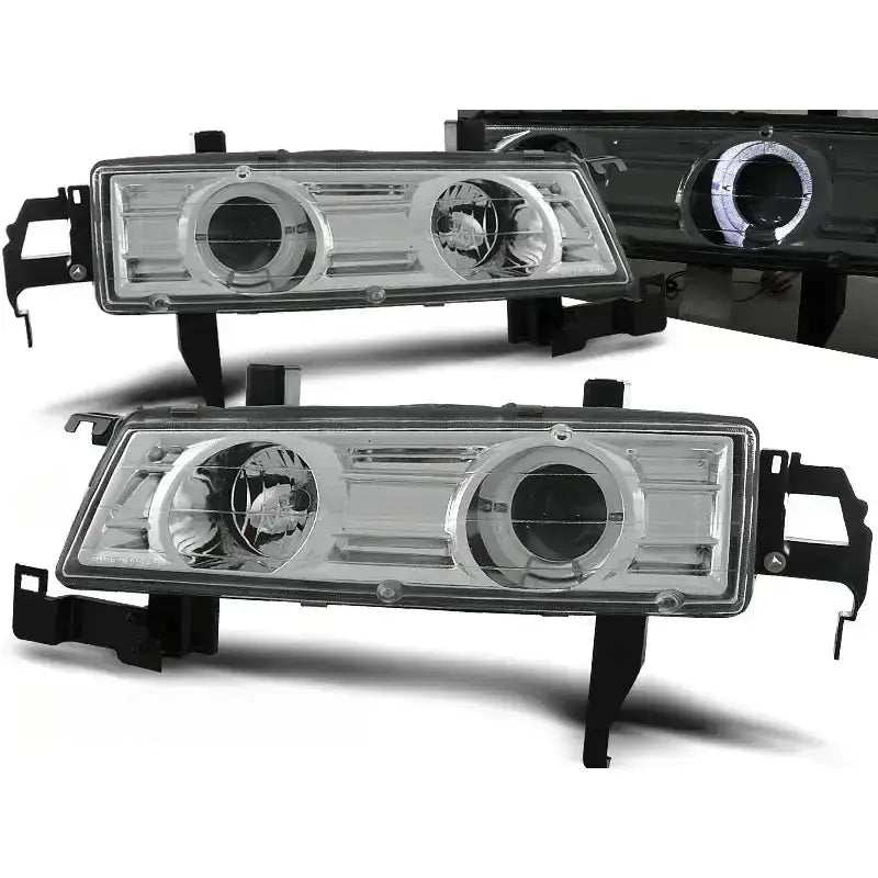 Frontlykter Honda Prelude Angel Eyes Chrome med sorte innfatninger og runde projektorlinser.