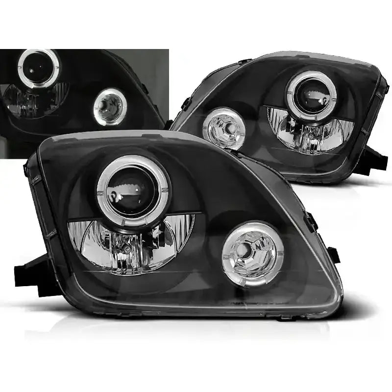 Frontlykter Honda Prelude 02.97-01 Angel Eyes Black med sotet glass og sirkulære LED-lys, front- og sidevisning.