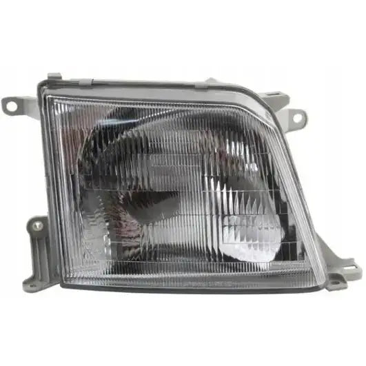 Frontlykter høyre Toyota Land Cruiser J90 J95 96-99 i klart glass med sølvfarget ramme og festebraketter.