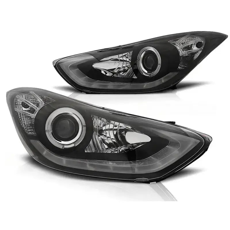 Hovedlykter Hyundai Elantra 11.10- Black Led med sølvreflektorer og runde linseelementer, skrå vinkel.