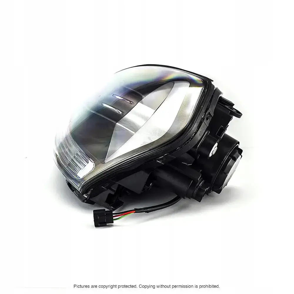 Headlights Hyundai ix35 10-13 H4 i svart og klar plast, skrå vinkel med synlig ledningsuttak.