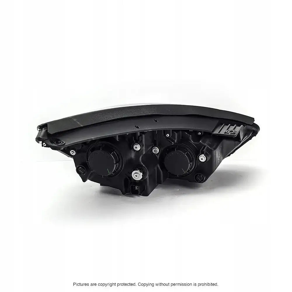 Headlights Hyundai Ix35 10-13 H7 sett bakfra med synlige skruefester og to runde deksler.