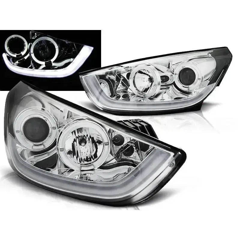 Frontlykter Hyundai Tucson IX35 10-13 med chrome tube light, LED-lyslist og projektorlinser, skrå vinkel.