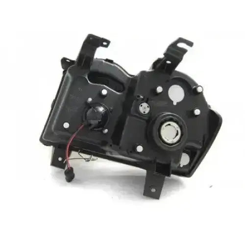 Headlights Jeep Grand Cherokee 05-08 bakside med monteringsbraketter, åpninger og rund motorenhet.