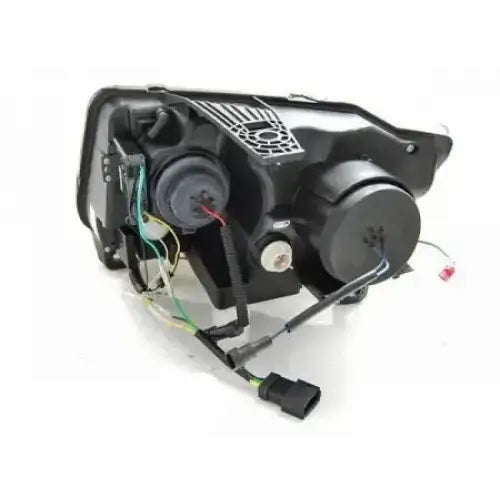 Headlights Jeep Grand Cherokee 11-13 Black Tube Light SEQ sett bakfra med synlige ledninger og detaljer.