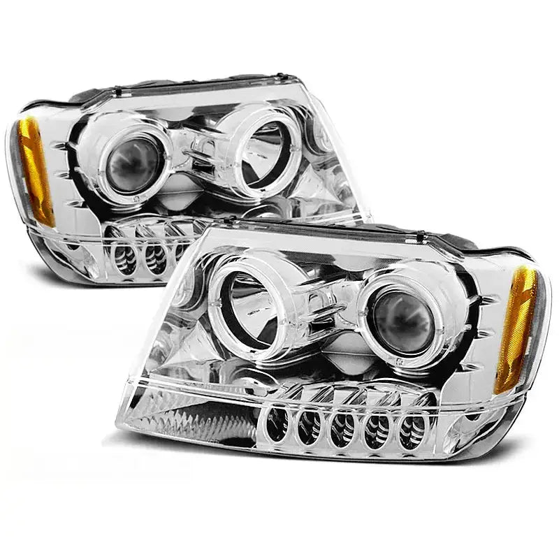 Frontlykter Jeep Grand Cherokee 99-05 Chrome med klare glass, gule blinklys og runde reflektorer.