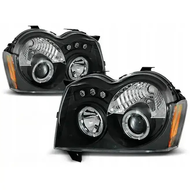 Frontlykter Jeep Grand Cherokee WH 05-08 Angel Eyes Black med runde linser og oransje markør.