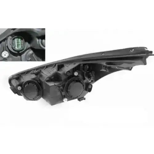 Hovedlykter Kia Ceed II 12-18 LED Black sett bakfra med runde lokk, festeskruer og grønn kontakt.