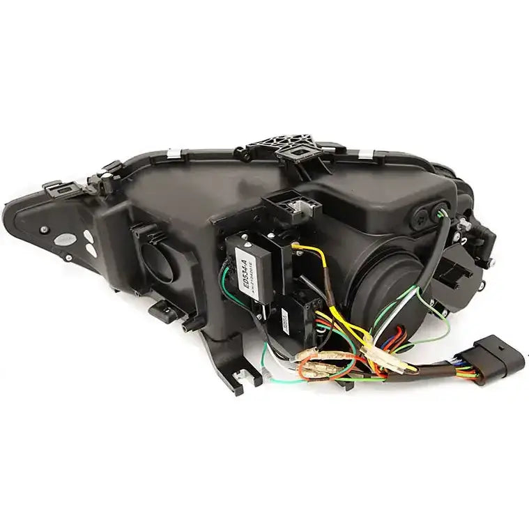 Hovedlys Led Black SEQ Audi A4 B8 sett bakfra med synlige ledninger, kontakter og elektroniske moduler.