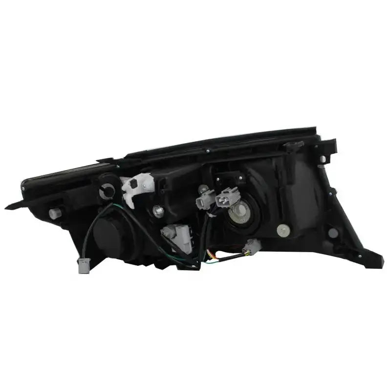 Frontlykter LED DRL bakside med synlige ledninger og justeringsmekanismer for Toyota Land Cruiser J200.