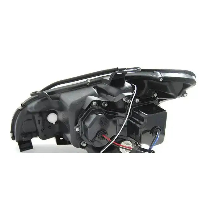 Headlamp bakside av Lexus RX 330/350 frontlykt med synlige ledninger og monteringspunkter.