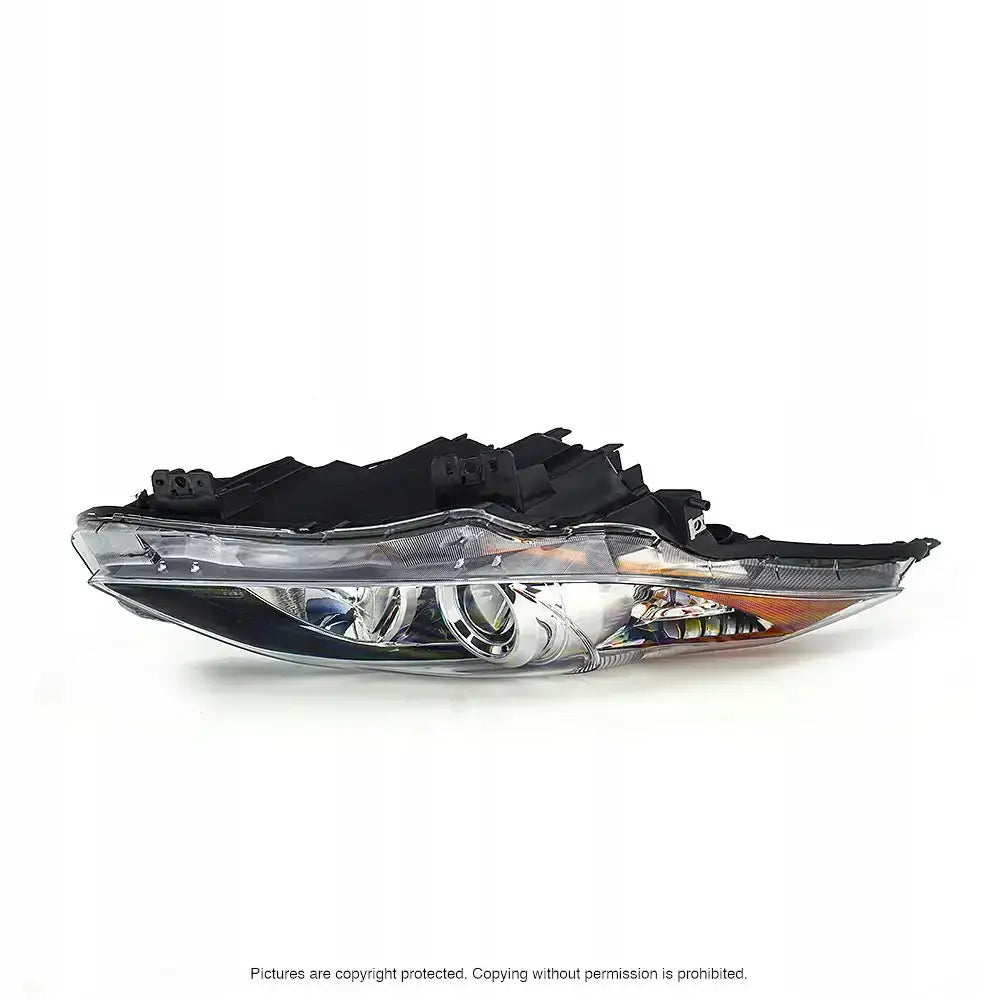 Hovedlykter Mazda 3 08-11 med klart glass, svart plast og oransje detalj, vist fra siden.