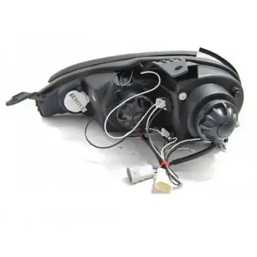 Hovedlys Mazda MX5 01-05 Angel Eyes Chrome sett bakfra med ledninger og justeringsmekanismer.