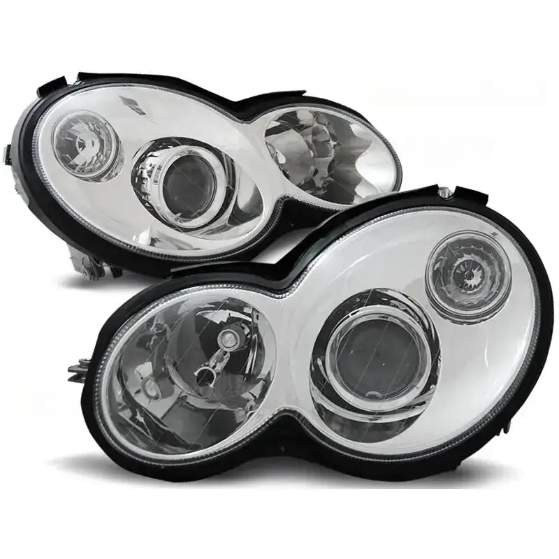Frontlykter Mercedes CL203 C-Klasse 00-04 i chrome med klart glass, sorte kanter og runde reflektorer.