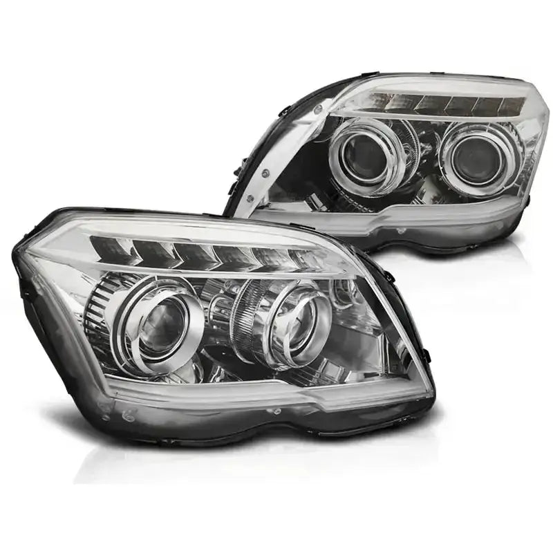Hovedlykter Mercedes GLK X204 Tube Light Chrome med LED-striper og projektorlinse mot venstre.