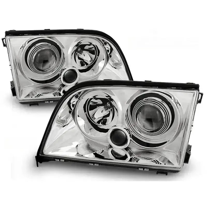 Frontlykter Mercedes W140 S-Klasse 03.91-10.98 i klart glass og krom, sett forfra med detaljerte reflektorer.