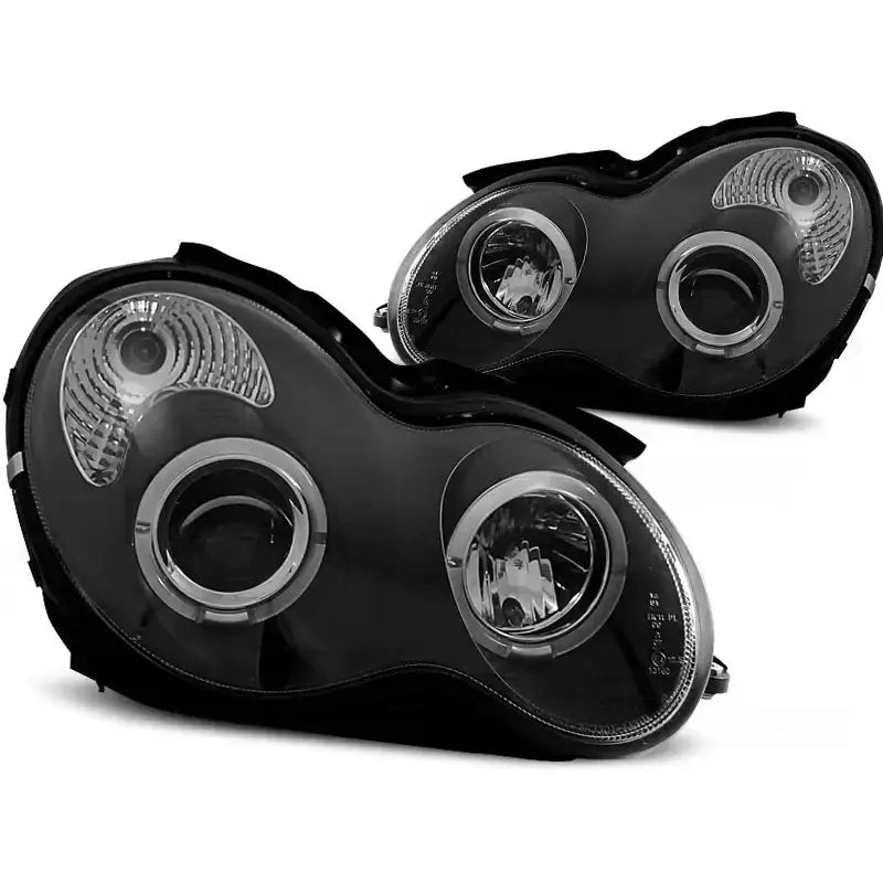 Hovedlykter Mercedes W203 C-Klasse Angel Eyes Black med runde projeksjonsglass og sølvdetaljer.