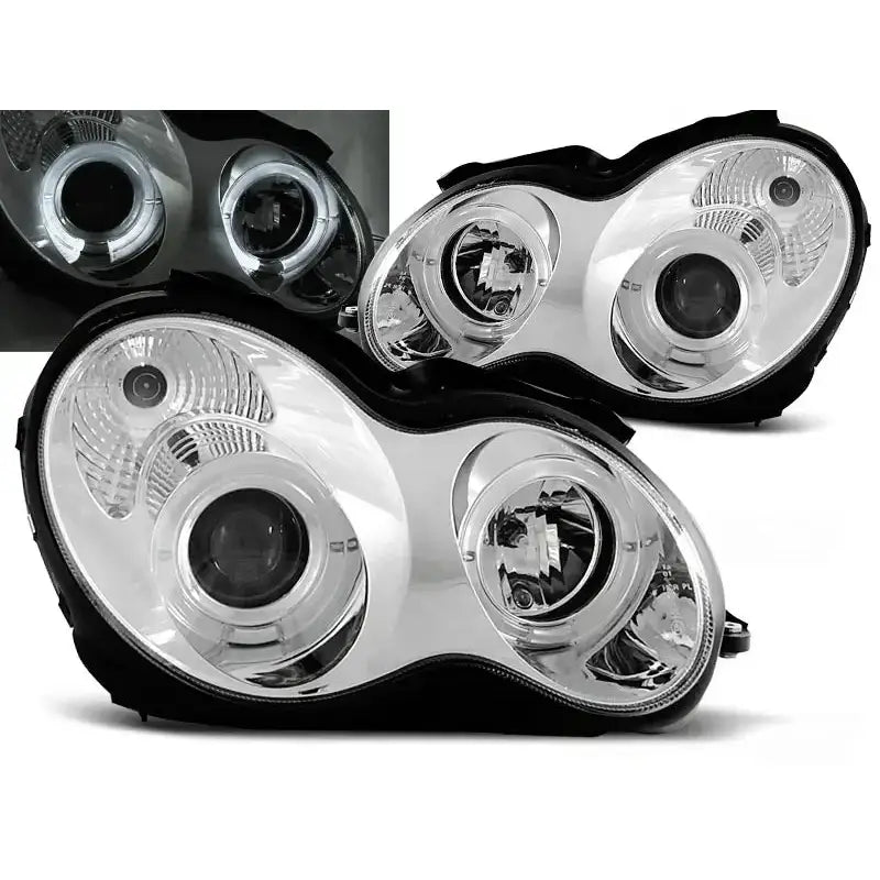 Frontlykter Mercedes W203 C-Klasse Angel Eyes Chrome med klart glass og tent lys, sett skrått forfra.