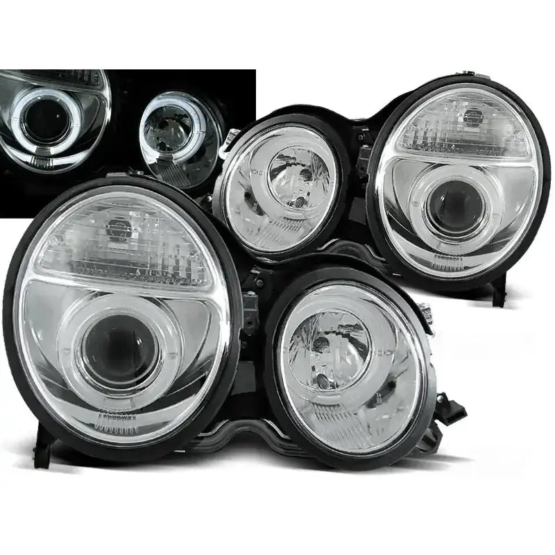 Frontlykter Mercedes W210 E-Klasse Angel Eyes Chrome sett vist fra skrå vinkel med lys på.