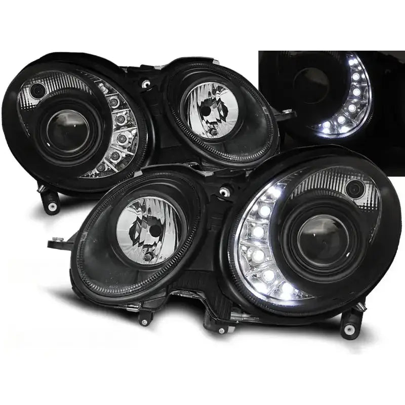 Frontlykter Mercedes W211 E-Klasse svarte med runde linser og integrerte LED-lys, front- og sidevisning.