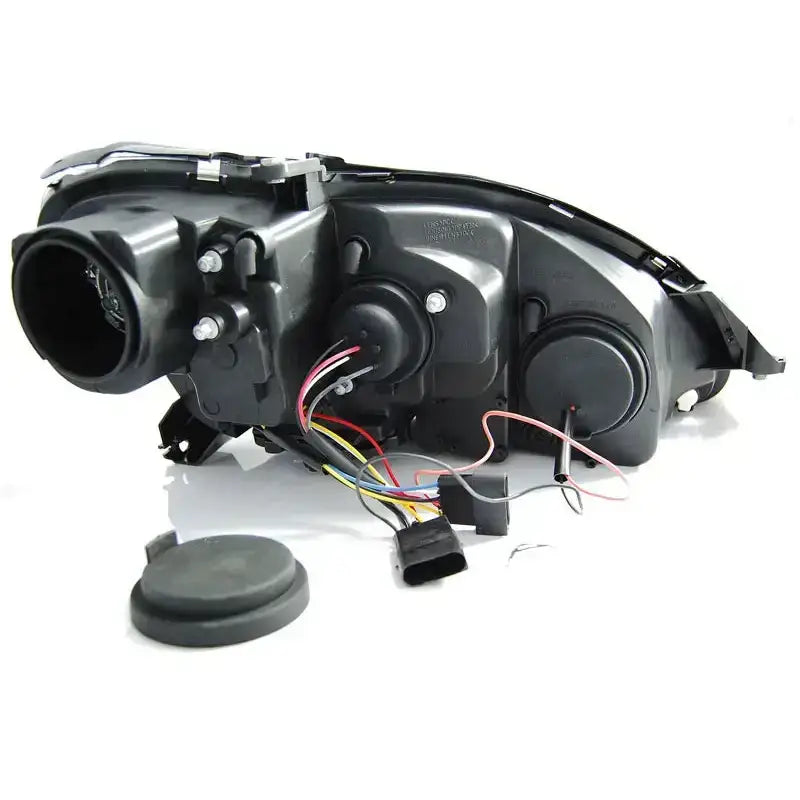 Hovedlykter Mercedes W220 S-Klasse bakside med synlige ledninger, koblinger og løs gummipakning.