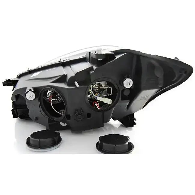 Headlights Mercedes W221 Daylight HID Black sett bakfra med åpne deksler og synlige ledninger på hvit bakgrunn.