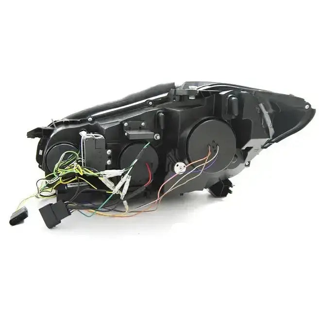 Headlamp bakside av Mercedes W221 05-09 Daylight HID Chrome med ledninger og kontakter synlige.