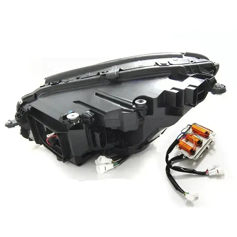 Headlights Mercedes W222 13-17 Black LED bakside med ledninger, koblinger og oransje moduler på hvit bakgrunn.